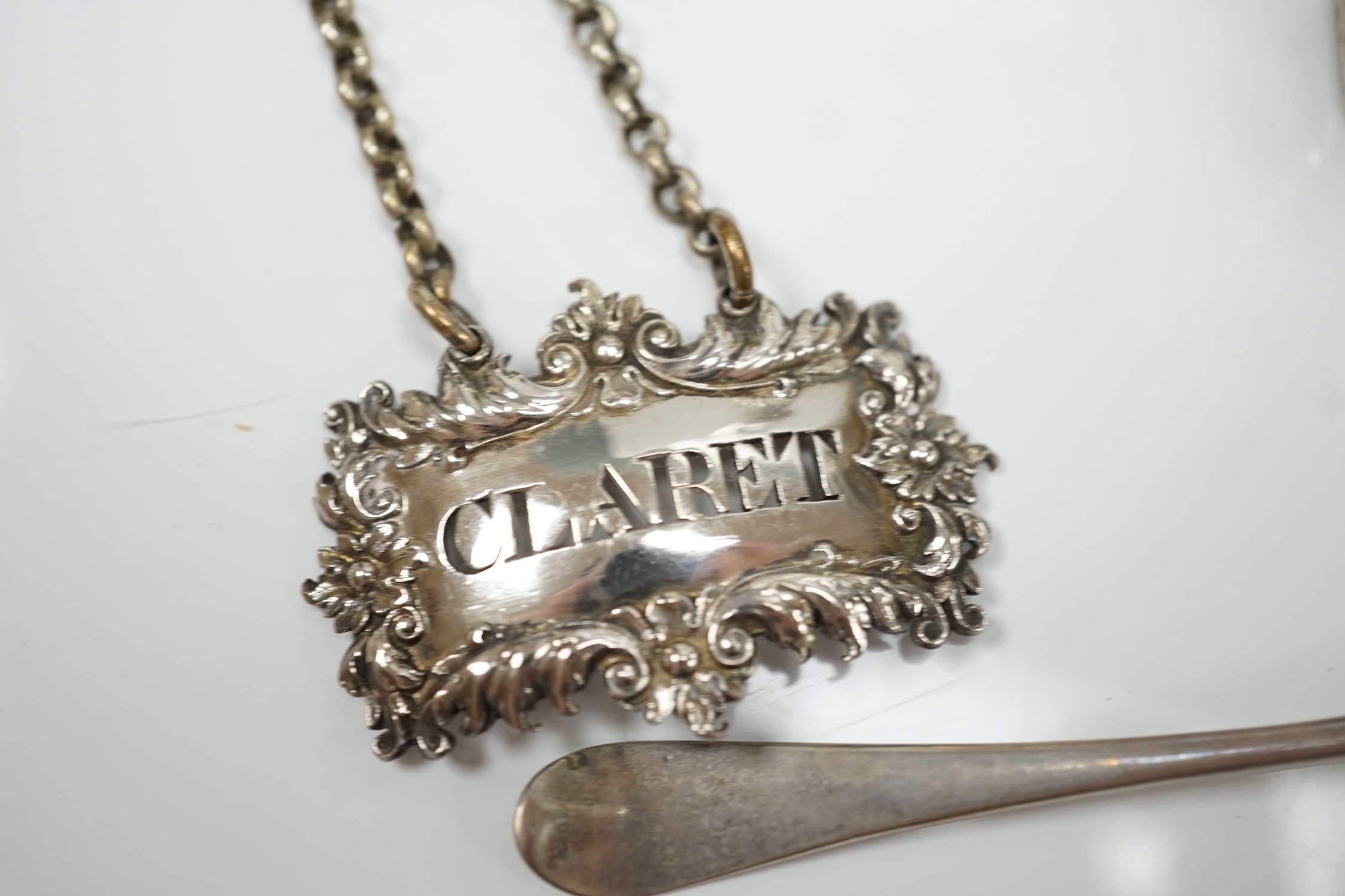 A mixed group of assorted small silver including a sugar caster, two pairs of Victorian bun salts, mustard pot, salt, pepperette, spoon and four white metal spoons.
